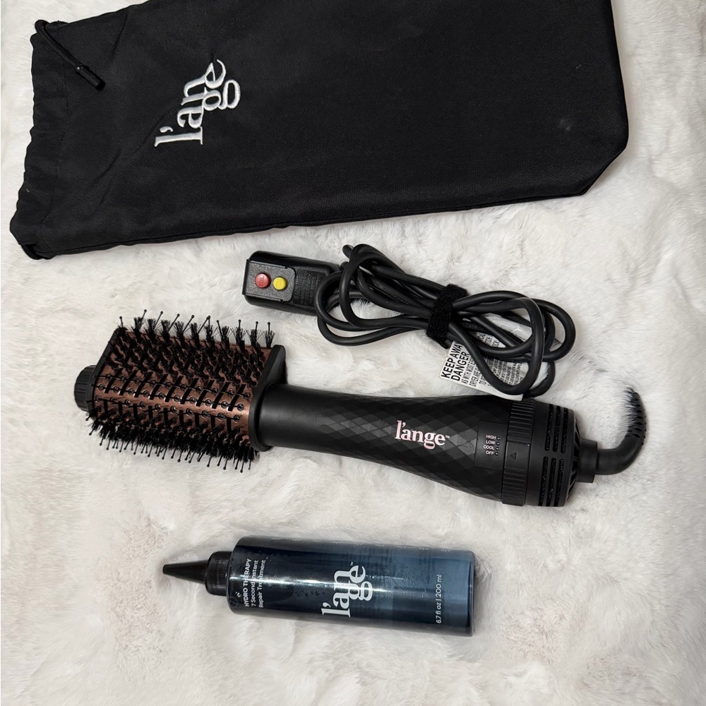 Lange black and copper rotating hot air styling brush